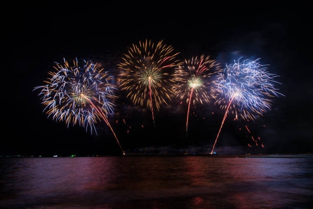 istock Beautiful firework display for celebration over the sea 1156712372