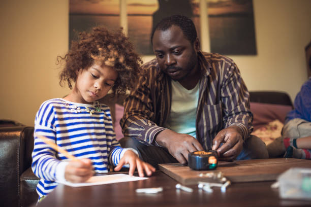 istock Father and his children doing some DIY work at home 1156715221
