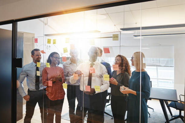 istock African American manager brainstorming with his team in an office 1156715912
