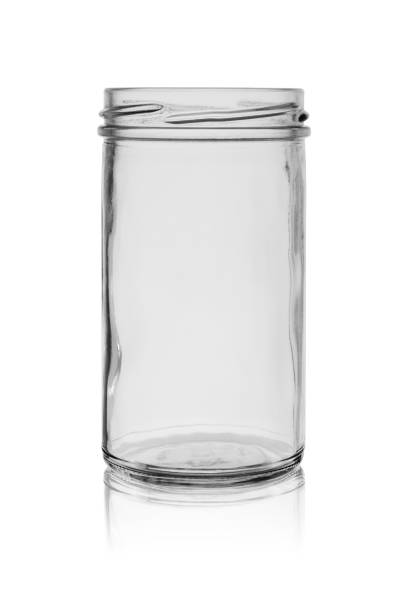 istock Opened glass jar without cover with reflection on a white background 1156716165
