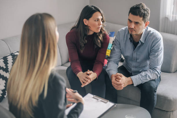 istock Home counselling with a young expecting couple with problems 1156717911