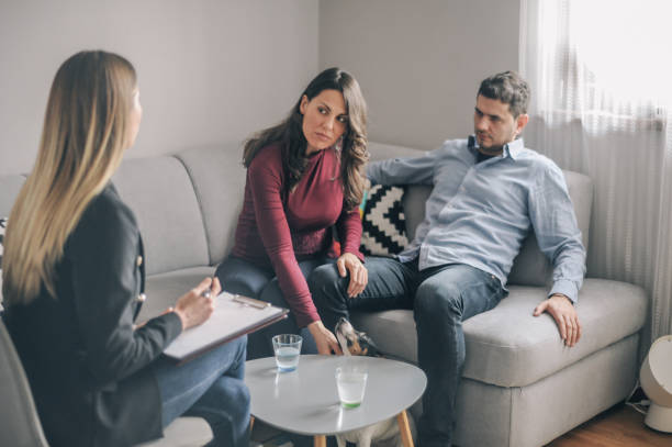 istock Home counselling with a young expecting couple with problems 1156717925