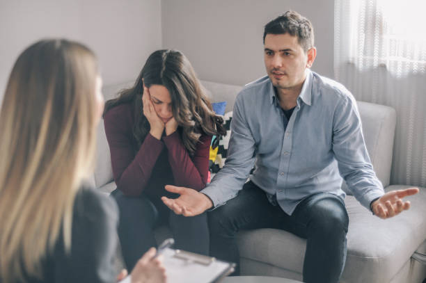 istock Home counselling with a young expecting couple with problems 1156717934