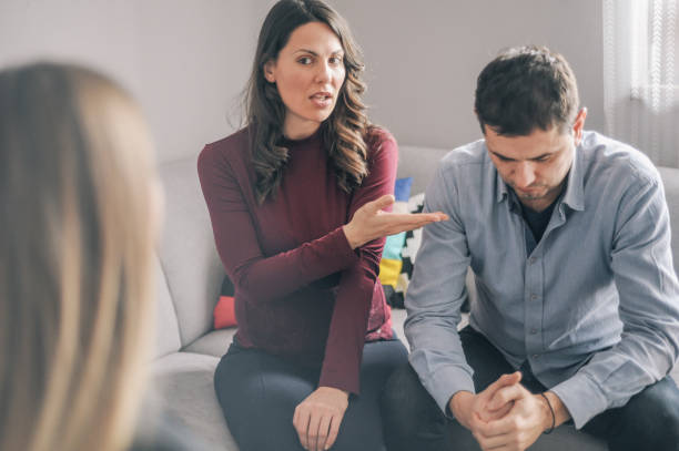 istock Home counselling with a young expecting couple with problems 1156717941