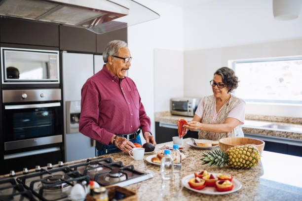istock Seniors drinking morning coffee at home. 1156718146