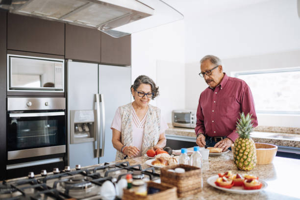istock Senior Latino couple having breakfast 1156718210