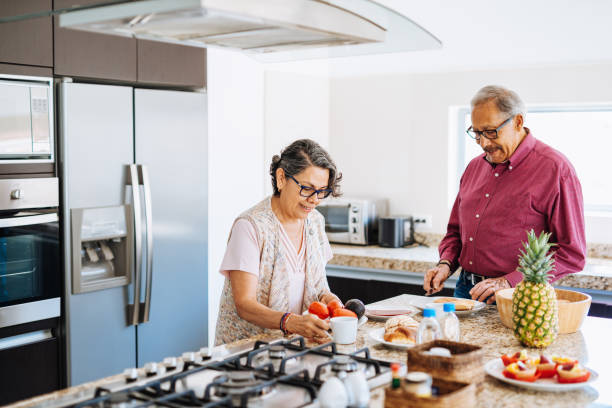 istock Seniors eating light breakfast to prevent hypertension. 1156718457