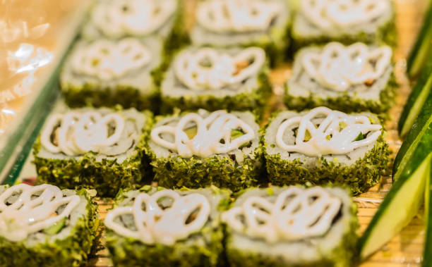 istock delicious green roll sushi display on the tray background 1156718679