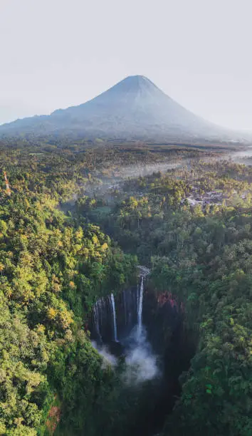 Scenic aerial view of Tumpak Sewu waterfall in the jungles on Java, Indonesia
