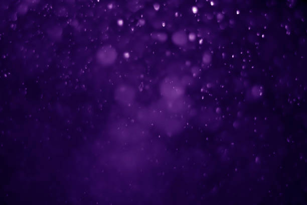 istock Bokeh purple proton background abstract 1156721492