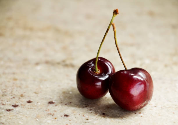 istock Bunch of sweet cherries on a granite table 1156721499
