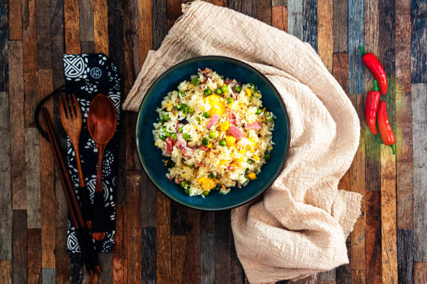 istock Homemade Chinese fried rice with vegetables and fried eggs 1156723978