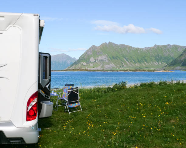 istock Camper car on beach, Lofoten islands, Norway 1156727505