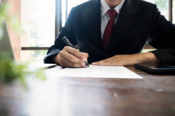 istock Businessman signing contract making a deal. 1156727590