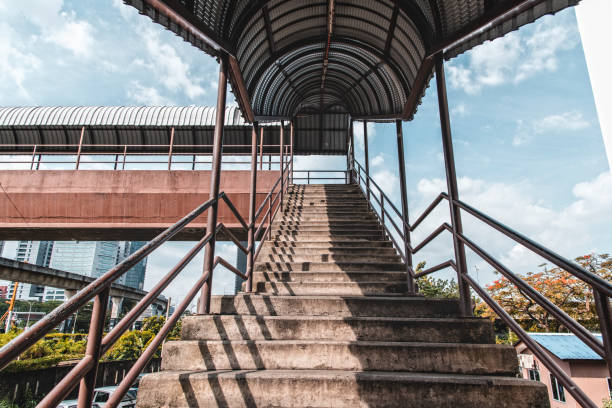 istock Stairs to footbridge above railway 1156727815