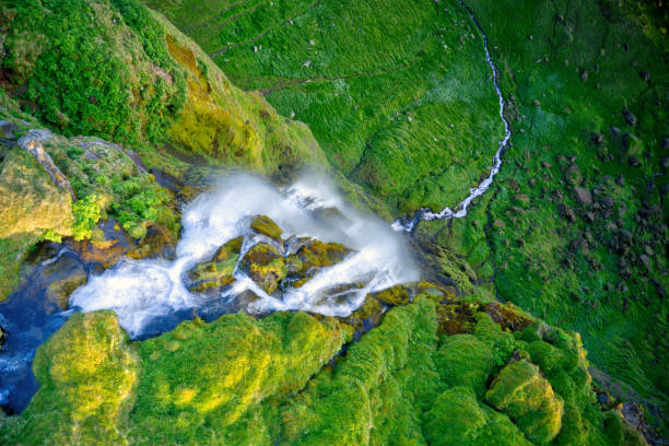 Dramatic top view of waterfall peak, Iceland. Iceland is famous for pure, dramatic and rough nature.