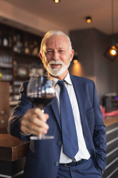 istock Senior businessman making a toast 1156739015