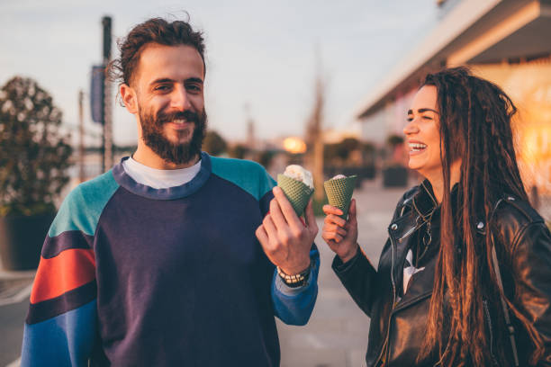 istock Happy couple eating ice cream 1156739569