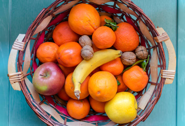 istock Fresh juicy fruit on a blue background 1156742283