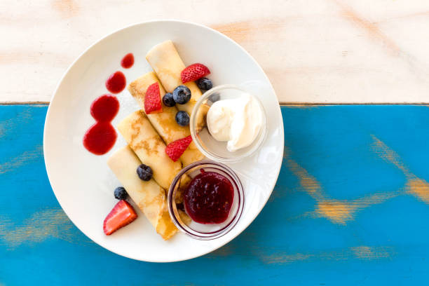 istock Pancakes stuffed with cottage cheese with fresh berrys 1156743502