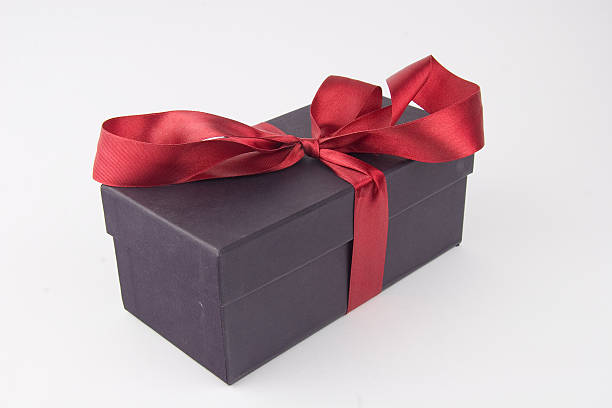 istock Gift box with a red bow and ribbon 115674460
