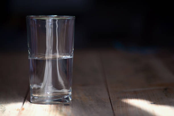 istock A half empty or half full glass of water 1156745027