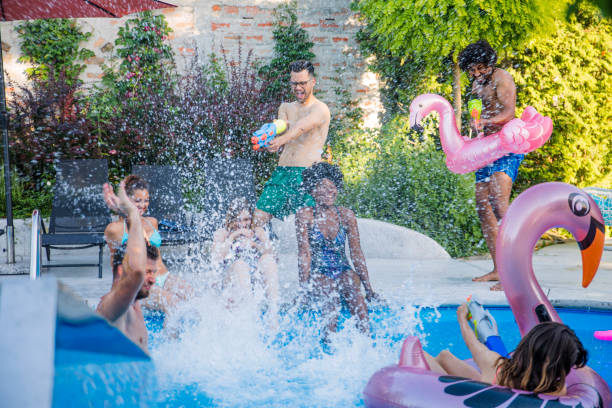 istock Summer fun at swimming pool 1156745160