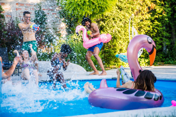 istock Summer fun at swimming pool 1156745322