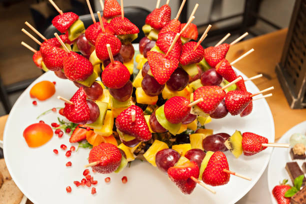 istock Juicy and fresh Party Fruit Salad sticks for party 1156745764