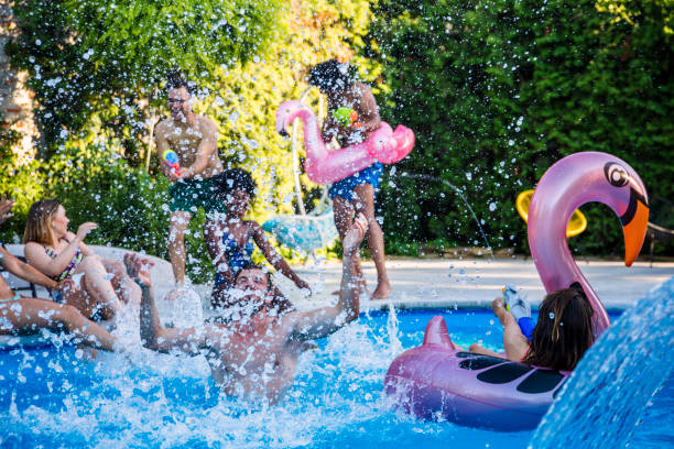 istock Summer fun at swimming pool 1156745798