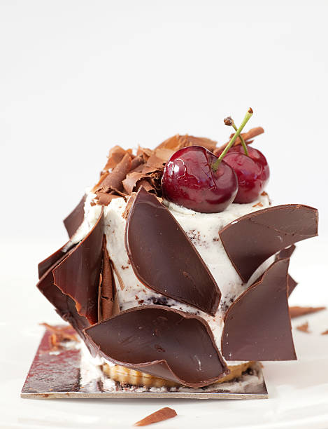 ice cream cake with chocolate and cherries stock photo