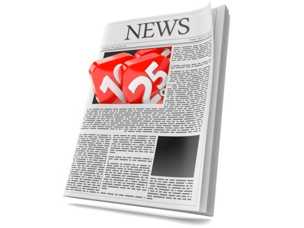 istock Percentage symbol inside newspaper 1156746857