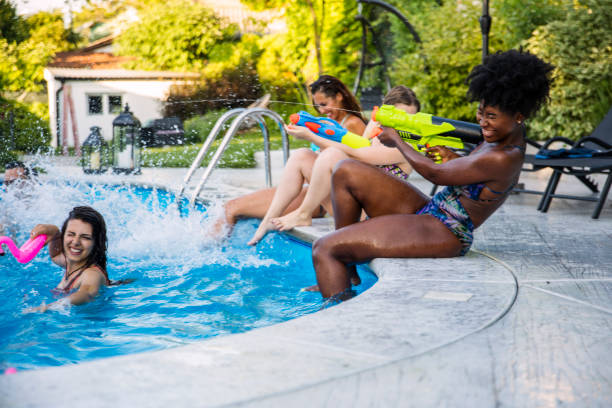 istock Summer fun at swimming pool 1156747276