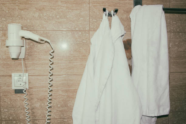 istock Rest in the hotel. Bathrobe in the bathroom. 1156749177