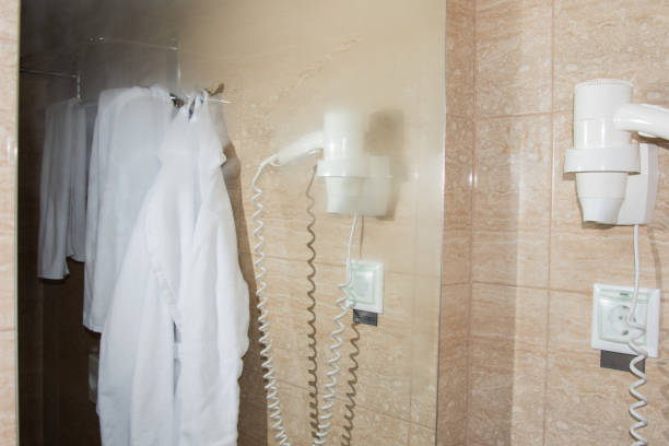 istock Rest in the hotel. Bathrobe in the bathroom. 1156749302