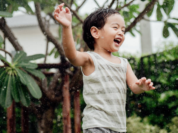 istock Baby Boy Enjoying First Summer Days In Nature 1156749544