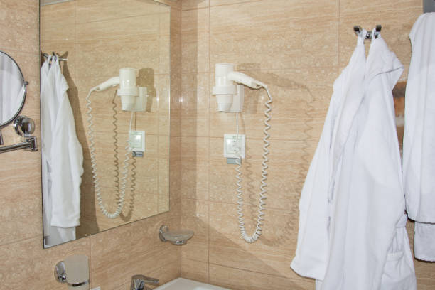istock Rest in the hotel. Bathrobe in the bathroom. 1156750754