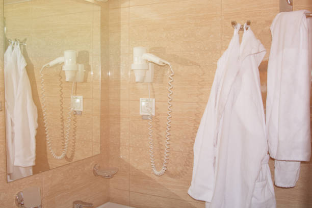istock Rest in the hotel. Bathrobe in the bathroom. 1156751784