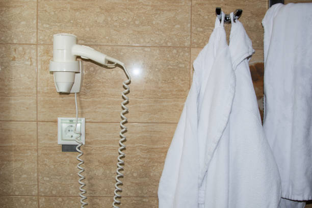 istock Rest in the hotel. Bathrobe in the bathroom. 1156751989