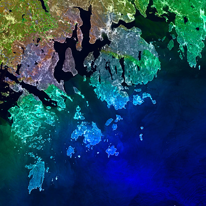 Acadia National Park and its surroundings, collage with neon colors rocky landscape carved by glaciers. Mountains and hills roll to the Atlantic Ocean. Elements of this image furnished by NASA.\n\n/urls:\nhttps://images.nasa.gov/details-GSFC_20171208_Archive_e000243.html\nhttps://visibleearth.nasa.gov/view.php?id=144147