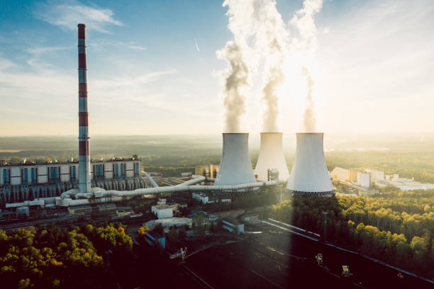 istock A Power plant with white smoke over it's chimneys 1156757203