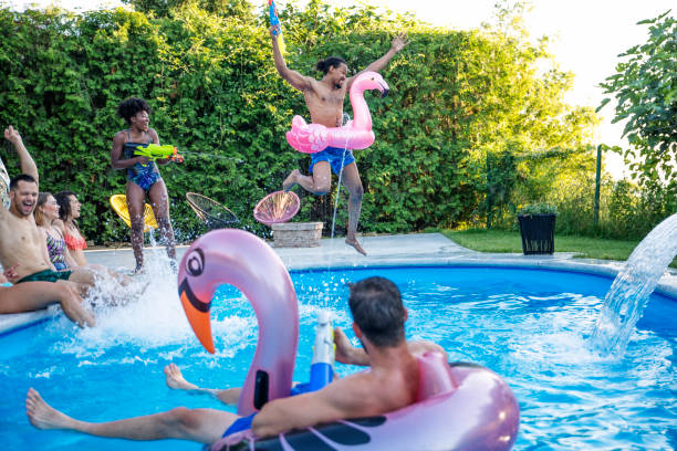 istock Summer fun at swimming pool 1156758667