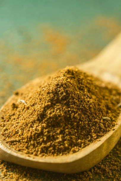 istock Ground cumin powder in wooden spoon. 1156759907