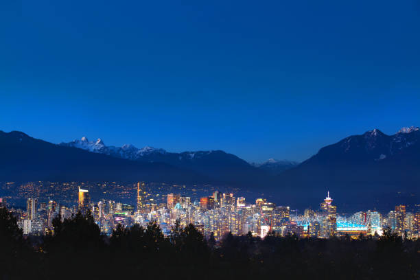 istock Wide angle view of downtown Vancouver financial district at night 1156766477