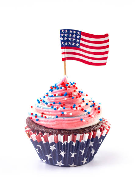 istock American Themed Cupcakes with Sprinkles and Decorations Isolated on a White Background 1156770159
