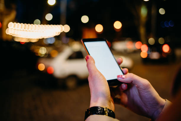 istock Close-up of woman using mobile phone 1156772563
