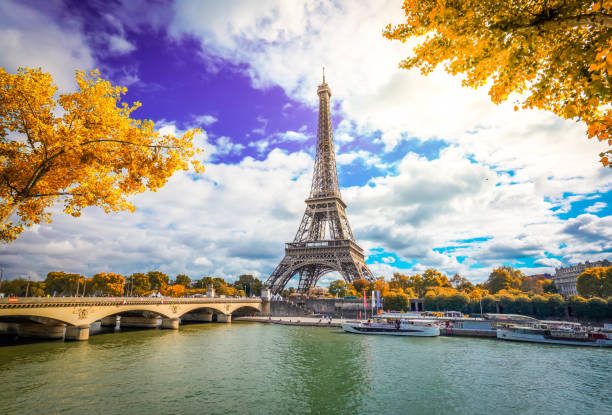 istock eiffel tour over Seine river 1156773172