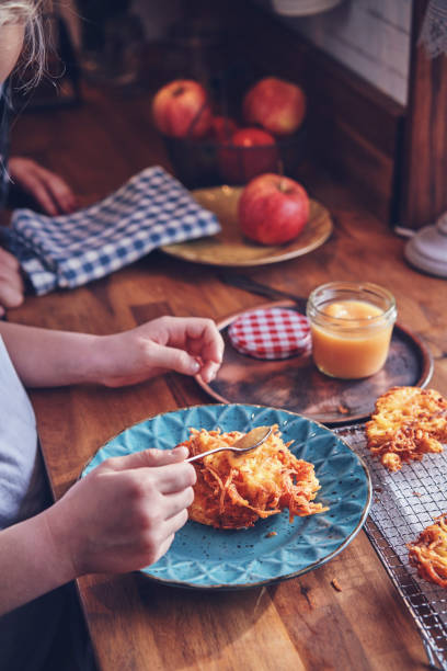 istock Preparing Rosti Potato Pancake in Domestic Kitchen 1156777370