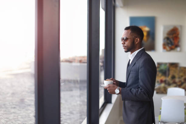 African business man checking in to a hotel.