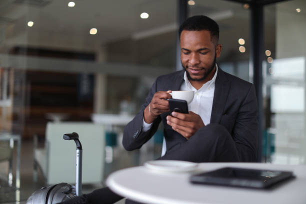 istock African business man checking in to a hotel. 1156778225